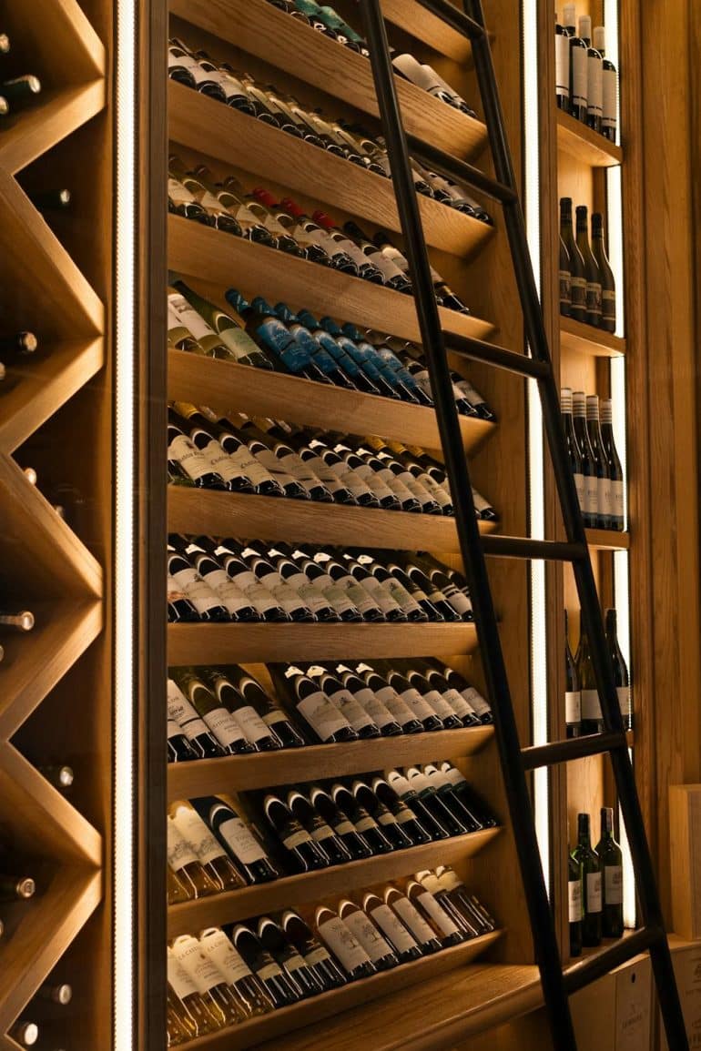 free-photo-of-wine-bottles-on-shelves